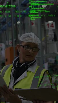 Vertical video: QA mgr checking tablet heeding gesture doing QC as green overlay drifting aisle 14