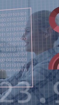 Vertical video: Woman tapping tablet by water causing HUD overlaying grid face box charts for tech