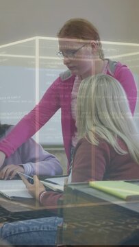 Vertical video: Student leaning pointing laptop causing code overlay marking notes for classwork