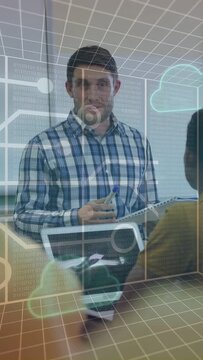 Vertical video: Man pointing marker at tablet in meeting, activating AR grid showing cloud icons