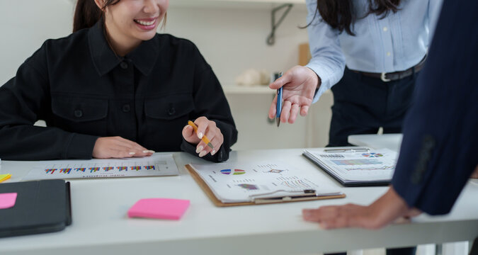 Business team analyzing financial data during office meeting