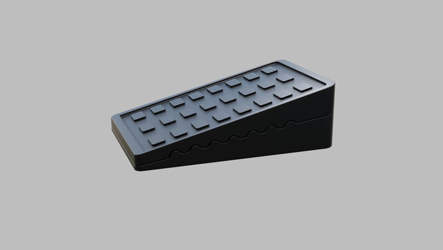 Black rubber wheel chock ramps isolated on white background