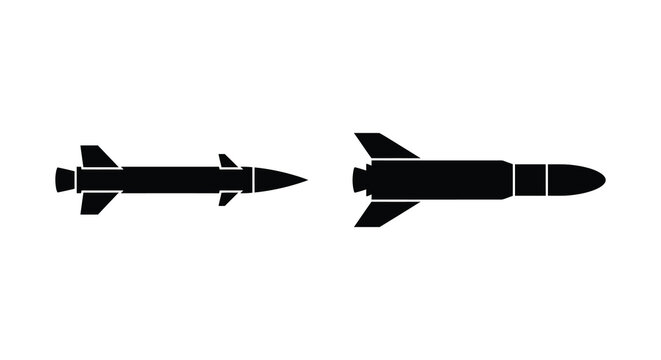 Two black missile silhouettes with wings pointing to the right on a white background silhouette