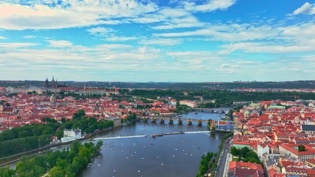Prague historic bridges above Vltava river. Prague aerial view with Charles Bridge. Prague Charles Bridge districts. Prague cityscape with old architecture.