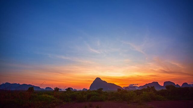 Time lapse fantasy cloud scape in sweet red sunrise above Samed Nang Chee, Phang Nga.

stunning sweet red sky in sunrise over the islands.

beautiful and popular landmark in Phang Nga.