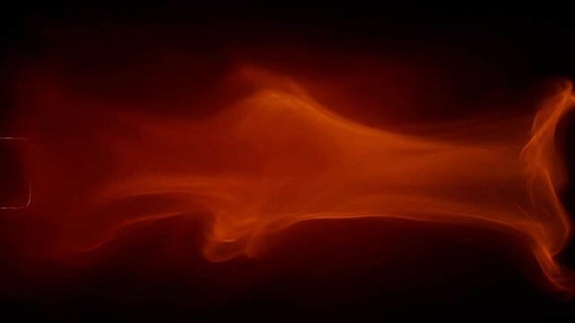 Orange fire light texture smoke flame glow abstract background red fiery orange light texture with smoke and soft glow in dark abstract background
