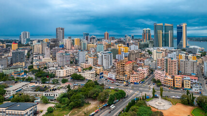 Aerial view of Dar es Salaam showcasing coastal urban development, skyline architecture, and vibrant city life. © STORYTELLER VISUALS
