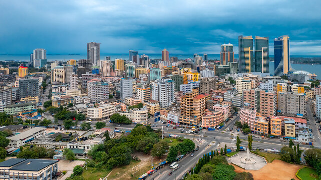 Aerial view of Dar es Salaam showcasing coastal urban development, skyline architecture, and vibrant city life.