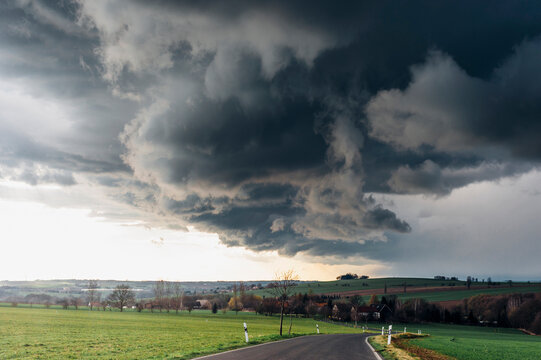 Stormy atmosphere over empty country road
