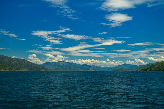 Marlborough sounds water and mountains under blue sky