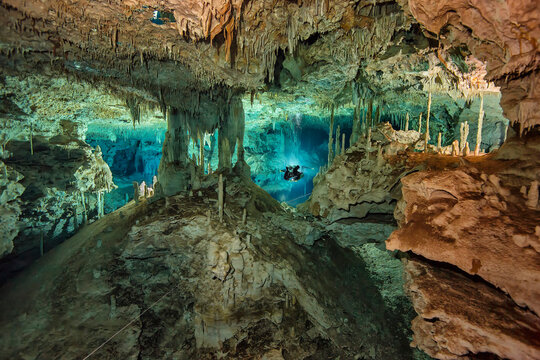 Mexico, Yucatan, cave diver exploring the cenote system Dos Pisos