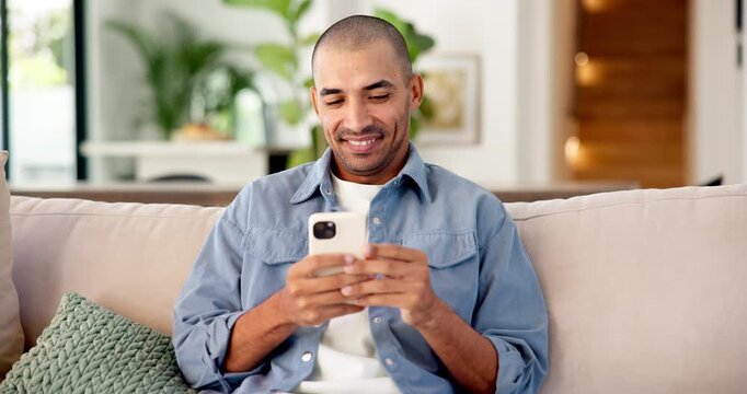 Relax, man and happy with phone on sofa for text message joke, social media post or status update. Weekend, person and laugh with mobile in home for funny comment, browsing and streaming for me time