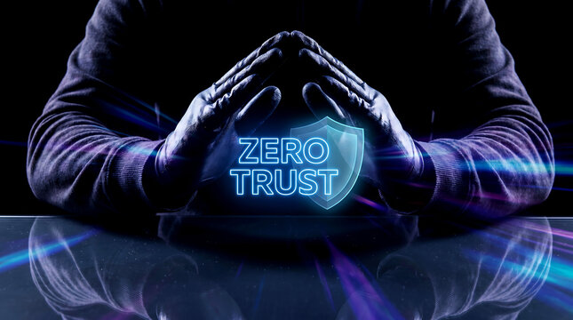 Person with hands forming a triangle around a glowing blue shield with zero trust concept