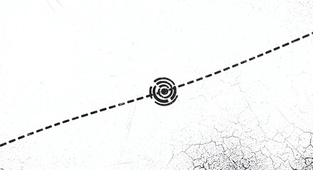 Fototapeta premium Black and white image of a bullseye target with a dotted line on a cracked surface
