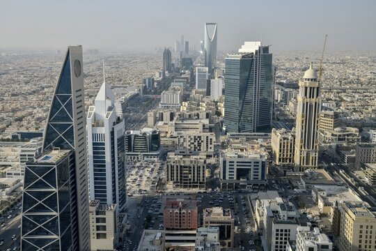 View from Al Faisaliah Tower over the skyline with the Kingdom Center, Riyadh, Saudi Arabia