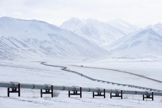 Oil pipeline from Prudhoe Bay to Valdez in the Arctic winter along the Dalton Highway, Haul Road, Alaska, USA