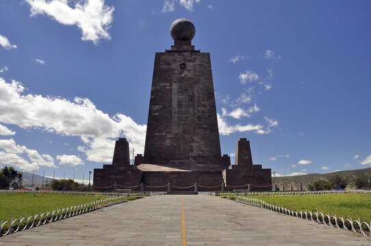 Ciudad Mitad del Mundo, Middle of the World City, monument with a globe and a painted line marking the equator, Quito, Ecuador