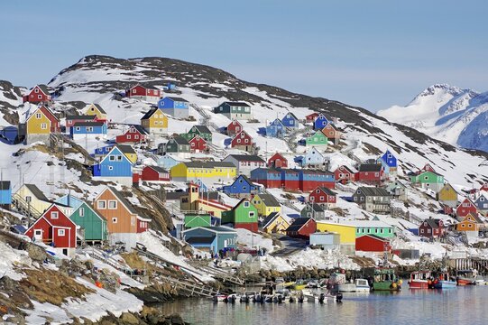Houses in different colours, snow landscape and small boats, Kaangamuit, West Greenland, Greenland, Arctic, Denmark