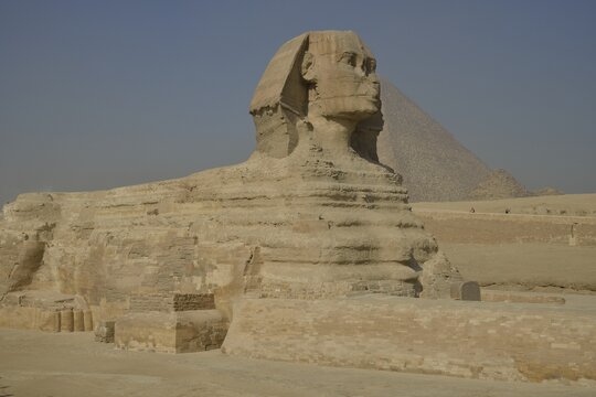 Sphinx or Great Sphinx of Giza, lion with a human head, built in the 4th Egyptian dynasty around 2700 BC, in front of the Pyramid of Cheops, Giza, Egypt