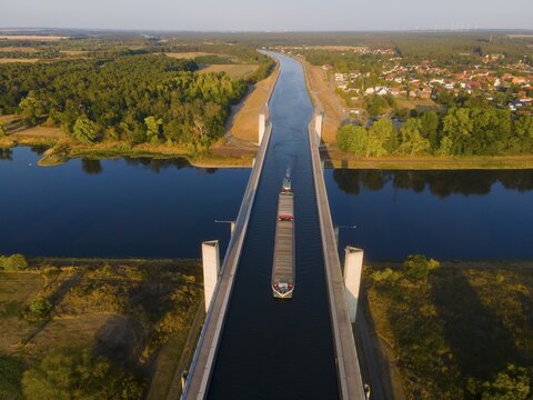 Drone shot, cargo ship on the Mittelland Canal, Magdeburg waterway junction, canal bridge, Mittelland Canal, Elbe, Magdeburg, Saxony-Anhalt, Germany