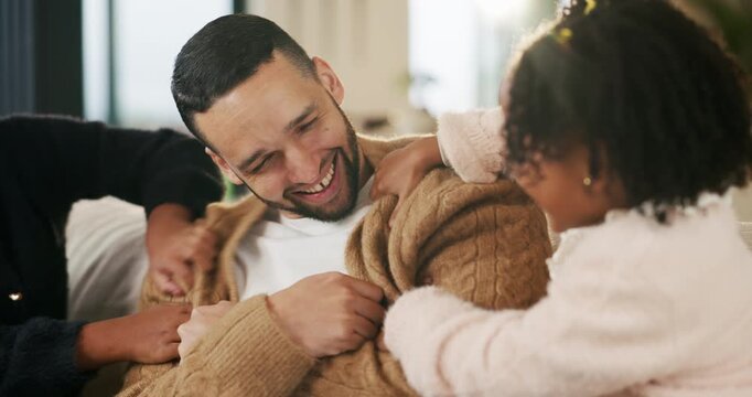 Father, girl and tickle with children on couch for play, bonding or love with connection in living room. People, dad and kids with games, laugh and fun on sofa, joke or relax at family house