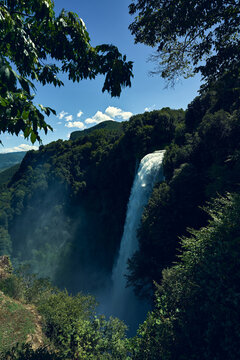 Cascata delle marmore waterfall flowing through green forest
