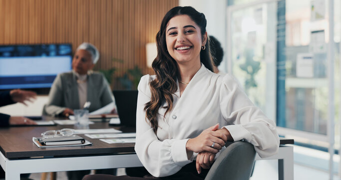 Analyst, portrait and happy woman in office meeting for performance review or company development. Female person, assessor or smile with team in boardroom for corporate growth, planning or analytics