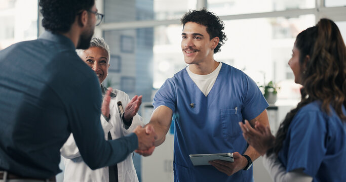 Medical, clap or people in hospital with handshake, promotion or introduction for clinical collaboration. Happy, tech or doctors with applause, achievement or team welcome in healthcare partnership.
