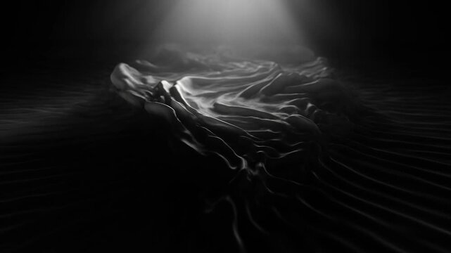 Abstract black liquid surface flowing under a soft light source, representing fluid motion, minimalism, transition, texture, depth, mystery, and dark aesthetic