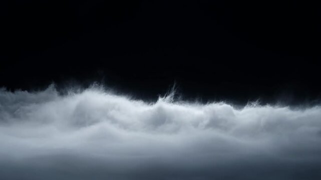 Dense white fog rolling against a deep black background, representing atmospheric mystery, ethereal transition, cinematic mood, calm depth, and abstract visual texture