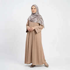 Naklejka premium a female model wearing a hijab with a white background
