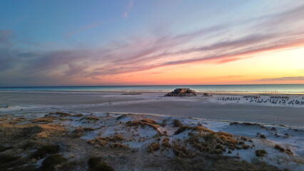 sunset over the wide beach of Sankt Peter Ording © Jenny Sturm