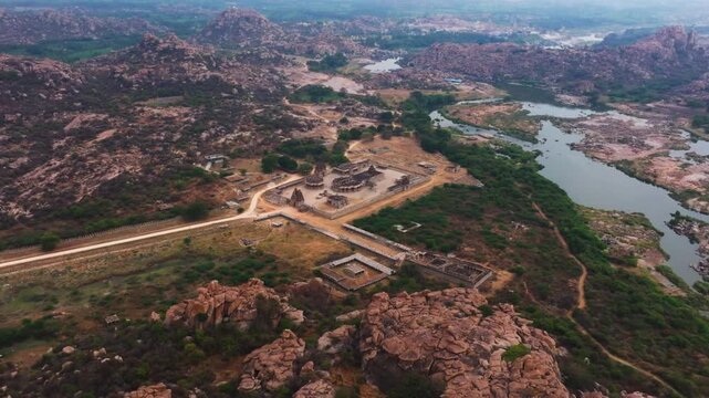 Sri Bhashyakara (Ramanuja) Gudi with Haleya Mantapa, The Stone Chariot, Maha Mantapa musical pillars and river at hampi, karnataka, india. day time, zoom in shot, drone shot, 4k.