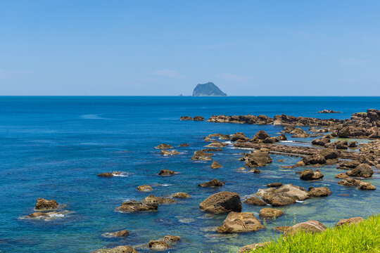 Rocky shore view with keelung islet background