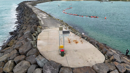 Fototapeta premium Aerial View of a Rocky Ocean Jetty Along the Great Ocean Road