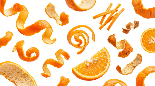 Vibrant orange peels and fresh citrus fruit slices dynamically scattered, isolated on a transparent background.
