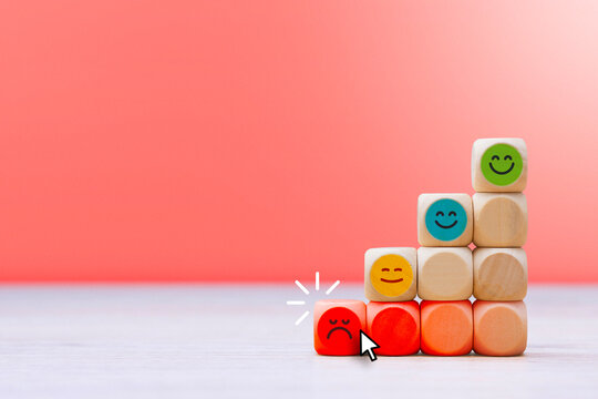 Customer satisfaction rating with positive and negative smiley icons on pink background with copy space. Client feedback, user experience and service quality evaluation concept for business analytics.
