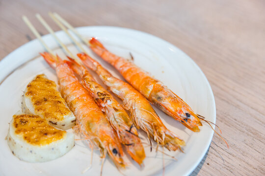 Grilled prawns and yam with mentaiko on skewers