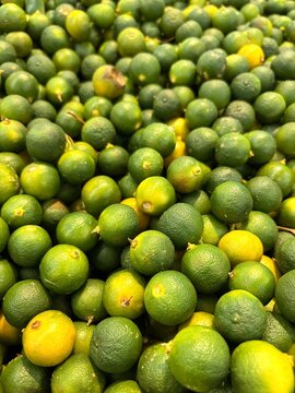 lemons and limes The items shown are Calamansi limes, also known in Malaysia as Limau Kasturi