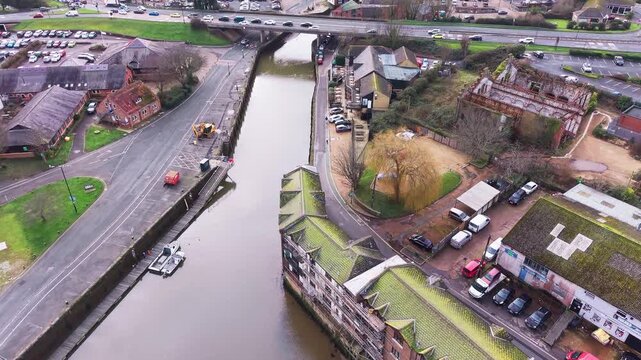 Aerial drone view along the River Medina towards Newport Quay, Isle of Wight, England. 4K aerial drone footage flying along the River Medina towards the quay area