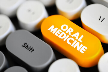 Naklejka premium Oral Medicine - medical specialty dedicated to the prevention, diagnosis, and treatment of diseases of the mouth, text concept button on keyboard