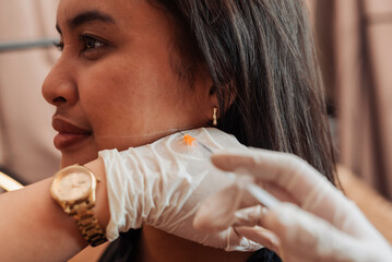 Female patient receiving mesotherapy treatment at an aesthetic clinic for upper jawline sculpting and facial contour enhancement © Mdv Edwards
