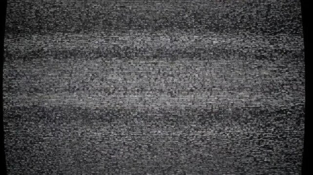 Abstract static noise pattern on a vintage television screen.