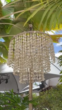 Lamp shade from shells on a beach in Curasao, Mambo beach