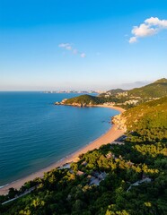 Obraz premium Stunning Aerial View of a Tropical Coastal Beach at Sunset.