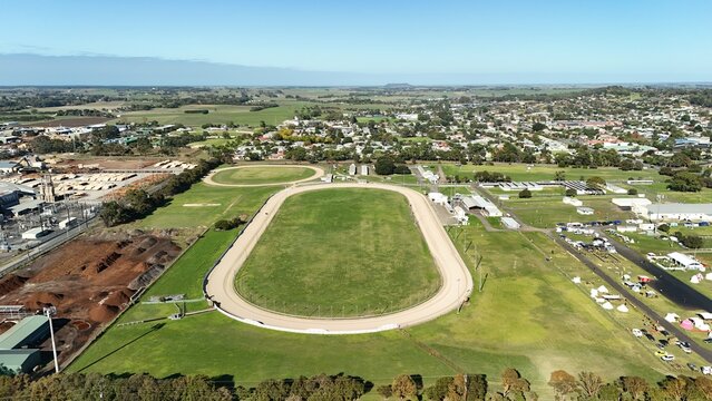 Mount Gambier Showgrounds, South Australia: 4K aerial drone view of event grounds, oval track, open field and surrounding suburb near Umpherston Cave