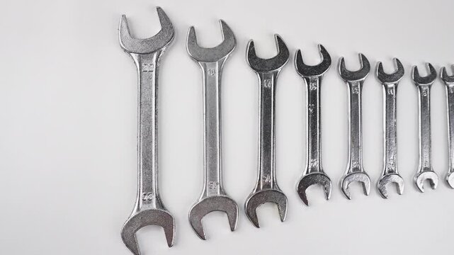 Handheld Shot of Open Ended Wrench Isolated on White Background for Industrial Tool Concepts