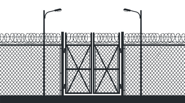 A chain link fence with double gates, barbed wire, and street lights creates a secure boundary