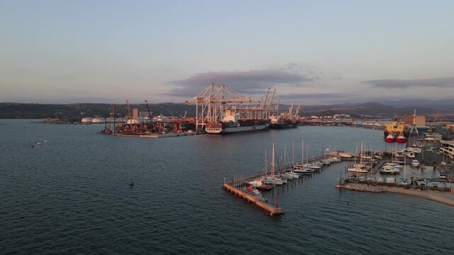 Promenade flight from old marina toward industrial harbor