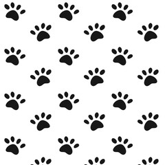 Fototapeta premium Seamless paw print pattern black on white background
